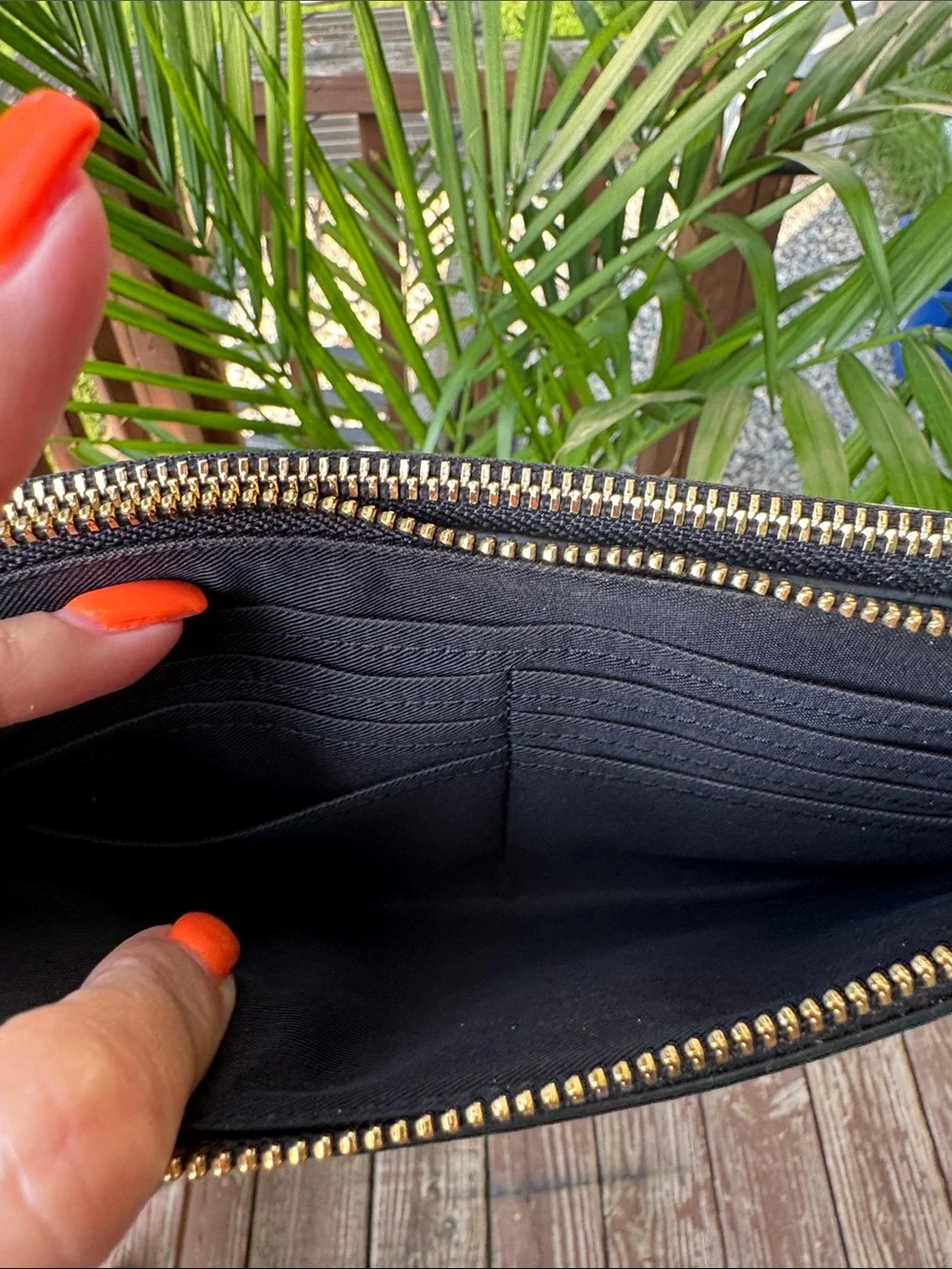 Coach wristlet featuring